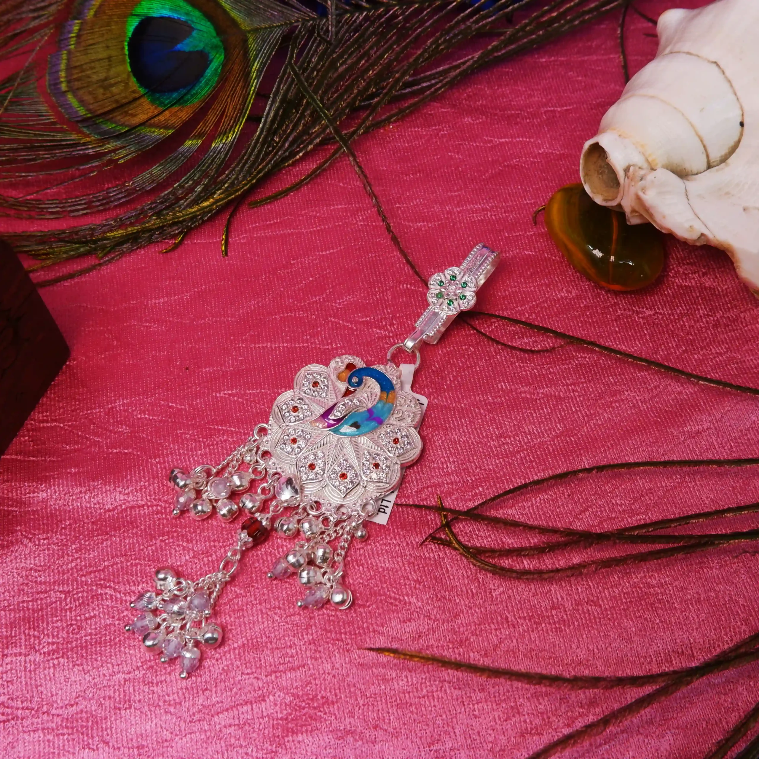 Silver Komor Jhapta